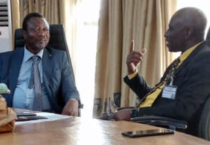 Professor Bamire stresses a point during the visit while Dr Odusanya listens with attention